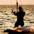 Silhouette of a kitesurfer on a gulf stock photo © acidgrey