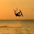 Silhouette of a kitesurf, a flying above water of a gulf stock photo © acidgrey