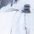 Snowplow removing the Snow from the Highway during a Snowstorm stock photo © aetb