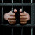 celda · de · la · cárcel · puerta · manos · primer · plano · prisión - foto stock © albund