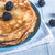 Crepes with blackberries on the wooden table stock photo © Alex9500