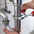 vízvezetékszerelő · javít · mosdókagyló · franciakulcs · közelkép · vízvezeték-szerelők - stock fotó © AndreyPopov