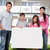 Young family holding a black white board stock photo © AndreyPopov