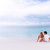 kochający · para · plaży · widok · z · tyłu · relaks · chłopak - zdjęcia stock © Anna_Om