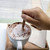 Human hand stir hot chocolate in cafe stock photo © art9858