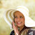 Cheerful fashionable woman in stylish hat and frock posing stock photo © artush
