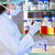  Female lab technician at work in a laboratory.  stock photo © belahoche