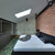 modernen · Stil · Schlafzimmer · zeitgenössischen · Backsteinmauer · grünen · Teppich - stock foto © bezikus