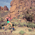 Woman trail running in mountains with backpack stock photo © blasbike