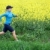 vrouw · lopen · buitenshuis · voorjaar · atletisch · veld - stockfoto © blasbike