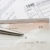 Check and silver pen with tax form stock photo © blasbike