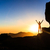 Woman climber success silhouette in mountains, ocean and sunset stock photo © blasbike