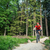 Mountain biker cycling riding in green forest stock photo © blasbike