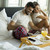 Happy young smiling couple having romantic breakfast in bed in t stock photo © boggy