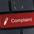 Complaint button keyboard with pen icon. stock photo © borysshevchuk