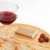 Pate, bread, glass of red wine, hazelnuts on wood plate stock photo © broker