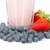 Strawberry milkshake with blueberries stock photo © broker