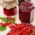 Jars of homemade red currant jam with fresh fruits stock photo © brozova