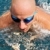 Detail of young man swimming stock photo © brozova