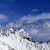 Panoramic view on snowy mountains at sun day stock photo © BSANI