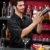 Young bartender make cocktail shaking drinks stock photo © CandyboxPhoto