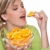 kobieta · jedzenie · pomarańczowy · biały · kobiet - zdjęcia stock © CandyboxPhoto