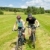 Sport mountain biking - man pushing young girl stock photo © CandyboxPhoto