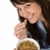 Smiling woman eat whole wheat cereal in pajamas stock photo © CandyboxPhoto