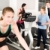 Young fitness woman doing spinning with instructor stock photo © CandyboxPhoto