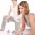 Young couple with weights and fitness ball on white stock photo © CandyboxPhoto