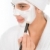 Teenager problem skin care - woman facial mask stock photo © CandyboxPhoto