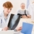 Doctor office - female physician x-ray patient stock photo © CandyboxPhoto