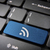 Blue keyboard key RSS icon, internet technology background stock photo © cienpies