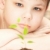 The boy observes cultivation of a young plant.  stock photo © cookelma