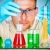 Young scientist in laboratory with test tubes stock photo © cookelma