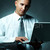 empresario · jóvenes · ordenador · portátil · negocios · trabajo · portátil - foto stock © dash