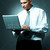 empresario · jóvenes · ordenador · portátil · negocios · trabajo · portátil - foto stock © dash