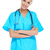Smiling beautiful doctor in scrubs stock photo © dash