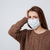 mujer · suéter · médicos · máscara · cabeza - foto stock © deandrobot