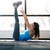 estera · de · yoga · ejercicio · jóvenes · mujer · bonita · gimnasio - foto stock © deandrobot