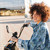 улыбающаяся · женщина · сидят · современных · мотоцикле · улице - Сток-фото © deandrobot