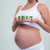 mujer · embarazada · número · ladrillos · primer · plano · retrato - foto stock © deandrobot