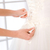 Bride putting white wedding dress stock photo © deandrobot