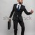 Cheerful young man in tuxedo with bowtie showing ok sign stock photo © deandrobot
