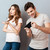 Portrait of a young couple standing with mobile phone stock photo © deandrobot