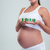mujer · embarazada · número · ladrillos · primer · plano · retrato - foto stock © deandrobot