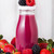 Glass bottles with fresh summer berries smoothie stock photo © DenisMArt