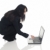 businesswoman - crouching laptop stock photo © dgilder