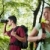 young man and woman hiking in forest with binoculars stock photo © diego_cervo