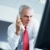 mature businessman on the phone in office stock photo © diego_cervo